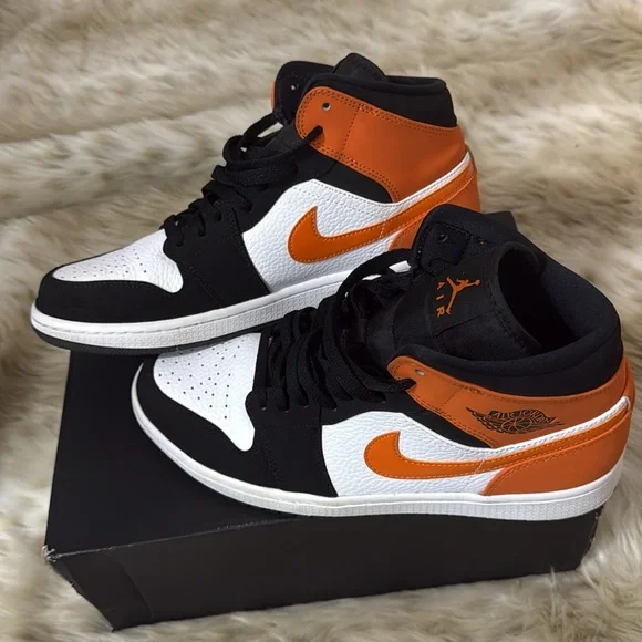 Air Jordan Black and Orange Sneakers